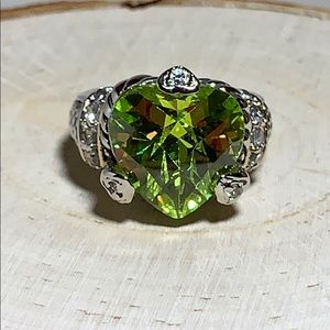 Green heart shape cut stone ring